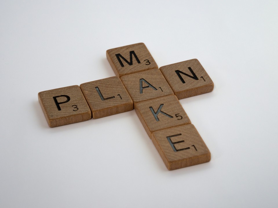 wooden letters that forms the words: plan make